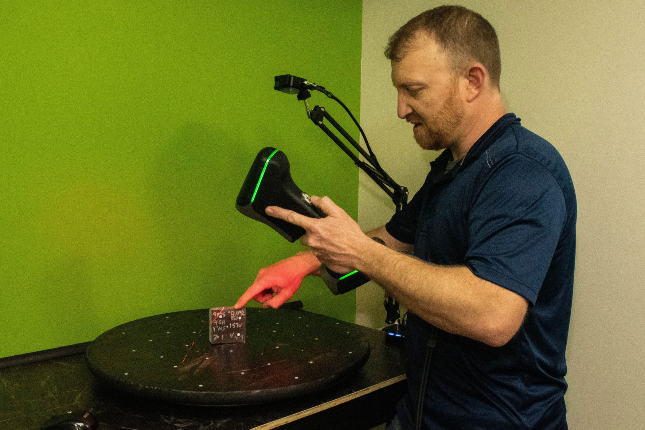 Jason Gaboury inspects a design