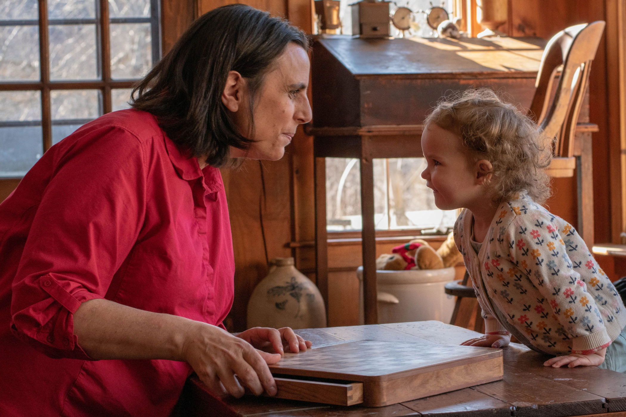 Cara Tyrrell interacting with a toddler