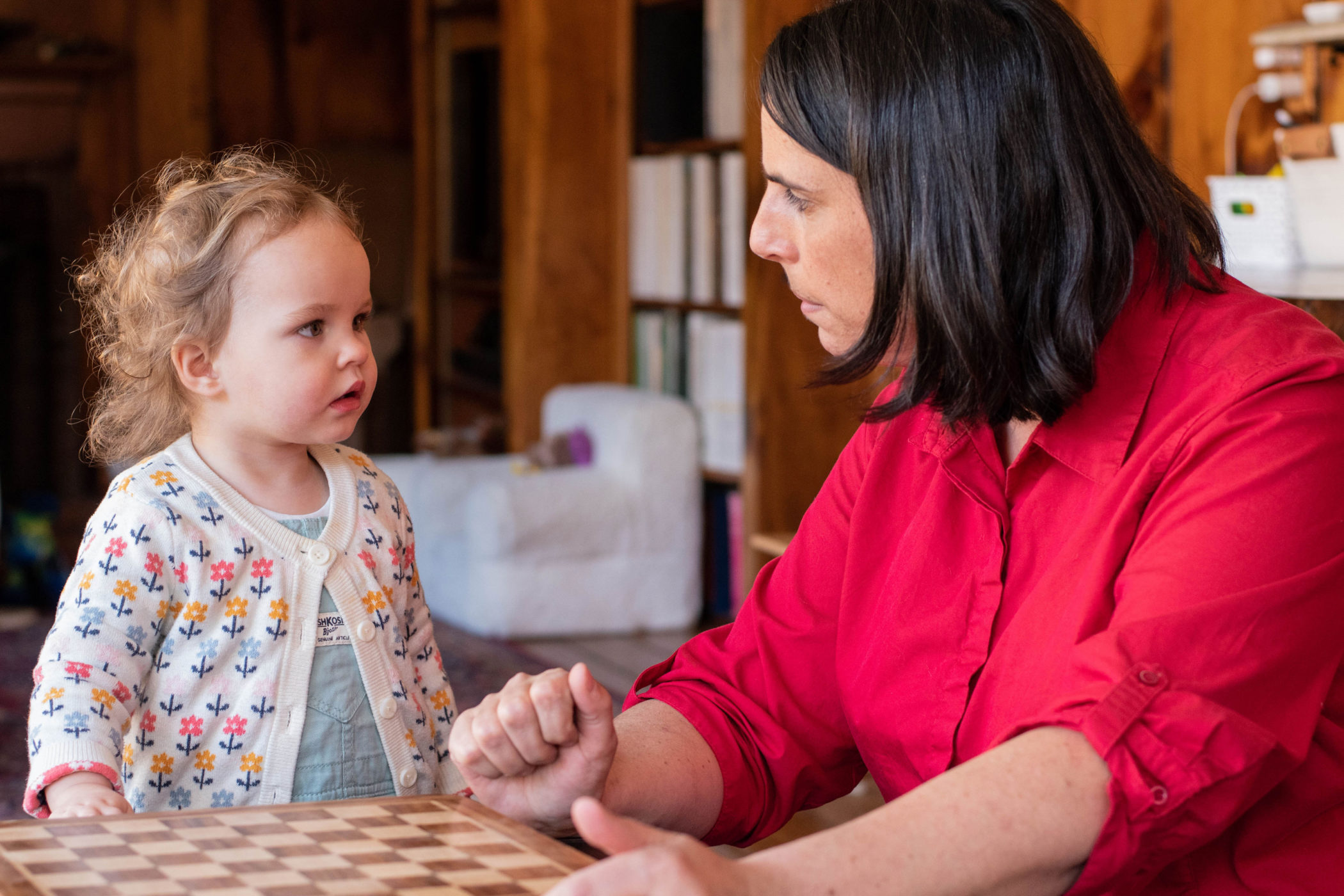 Cara Tyrrell interacting with a toddler