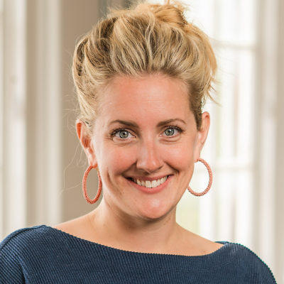 Rebekah Collinsworth headshot in front of a window