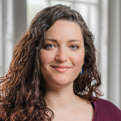 Leah Taylor headshot in front of a window