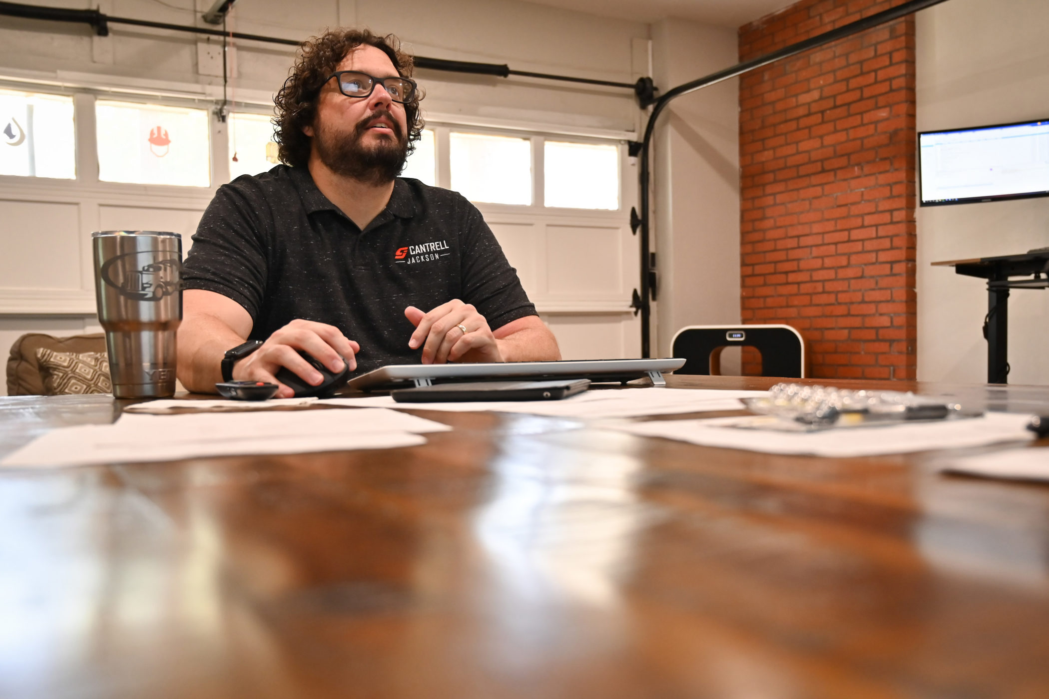Jake Cantrell working in his office in Ada, Oklahoma