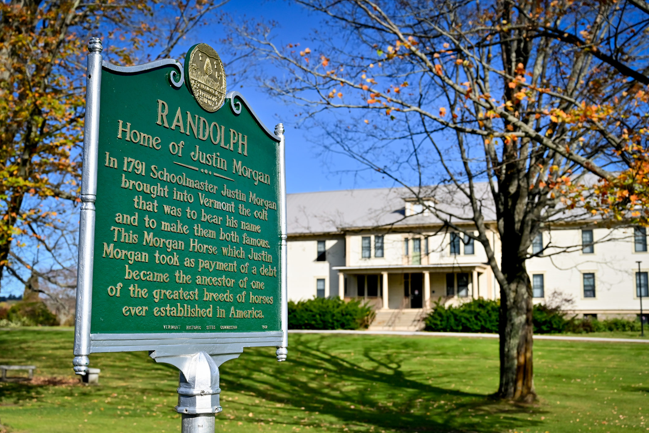 A historical marker sign notes the fame of Randolph's Justin Morgan.