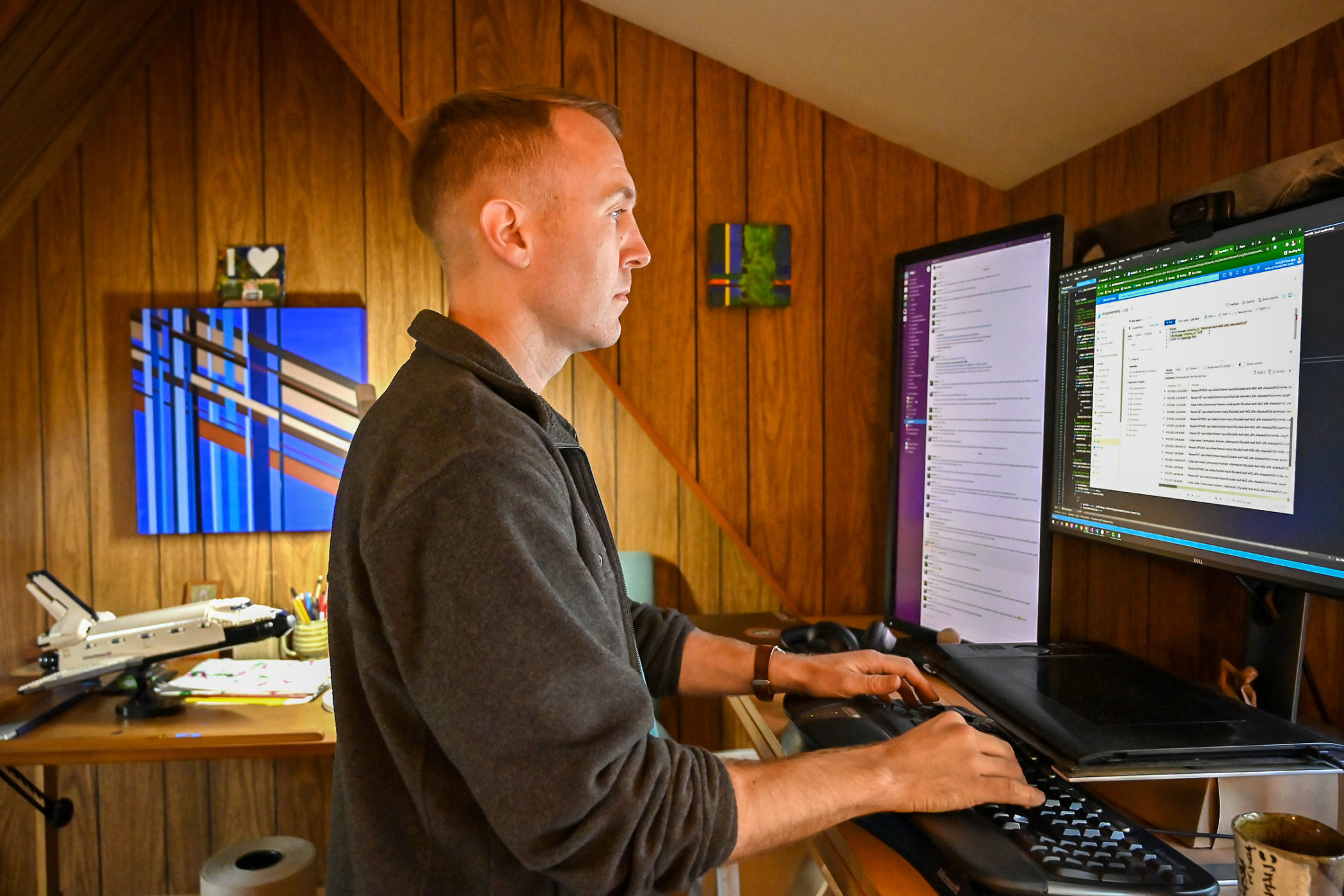 Andy Vig at the computer in his home office