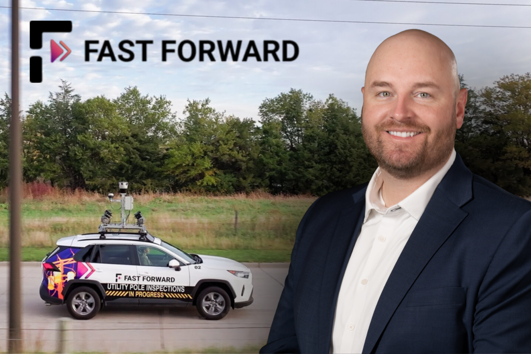 Dusty Birge, CEO/Founder of Fast Forward with company utility pole inspection vehicle in the background